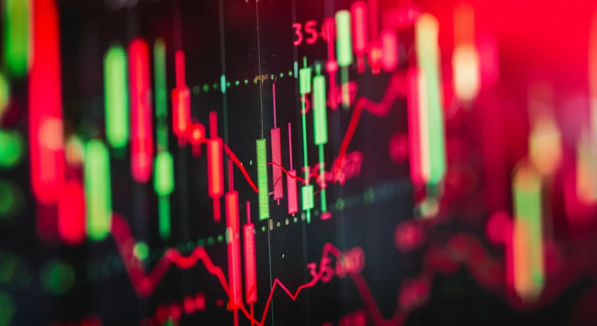 Photography of a financial chart with red and green candlesticks, representing the volatility and risks associated with inverse bond ETFs.