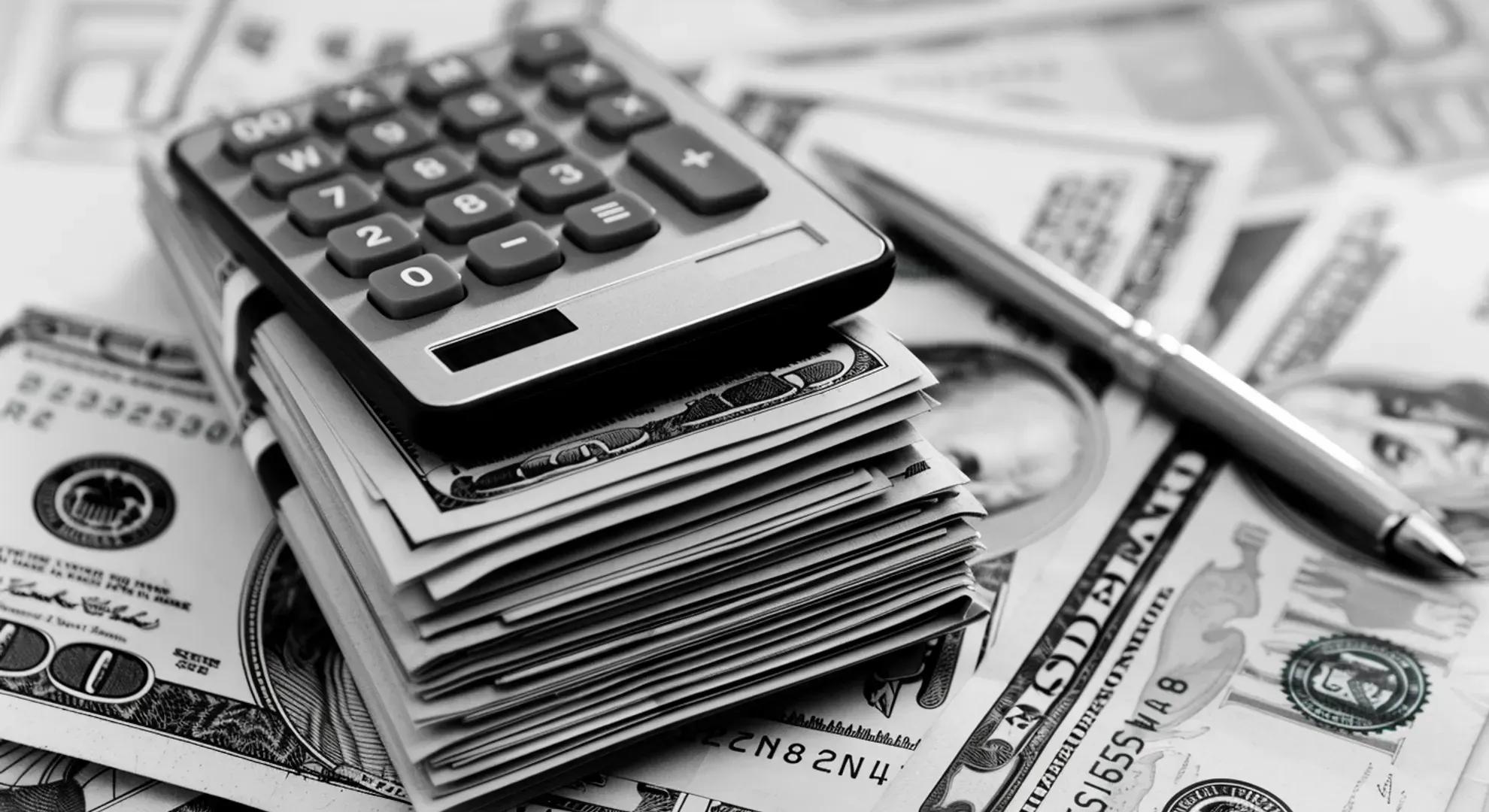 A black and white photography of a stack of dollar bills, with a calculator and pen on top, symbolizing the importance of careful financial planning and maximizing savings through high-yield money market accounts.